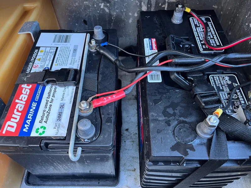 Slide: The Image of Duralast marine batteries in a 1990 Bass Tracker Pro 17 boat. - 46