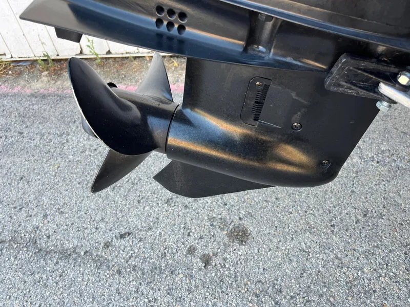 Slide: The Image of 1990 Bass Tracker Pro 17 boat propeller and lower unit. - 48