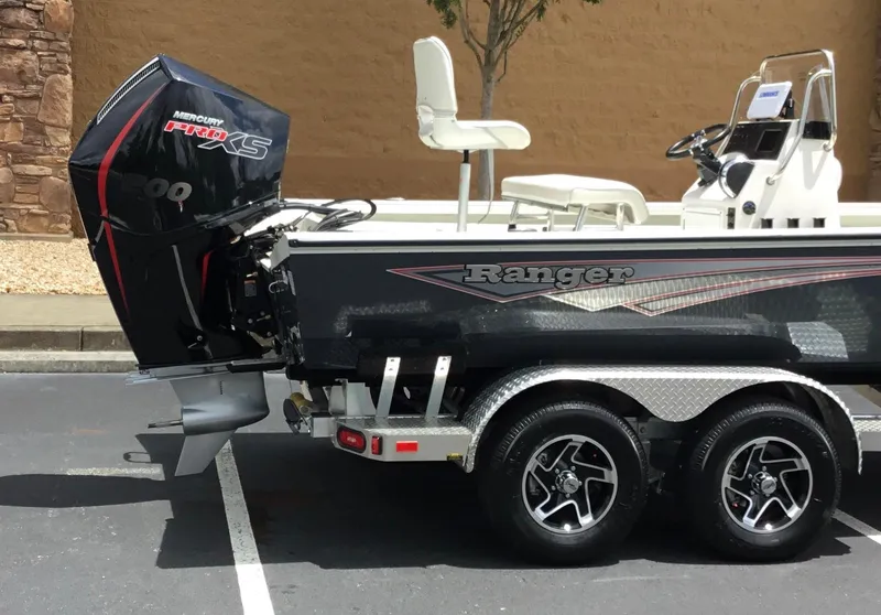 Slide: The Image of 2024 Ranger RB210 boat with Mercury Pro XS engine on trailer. - 8