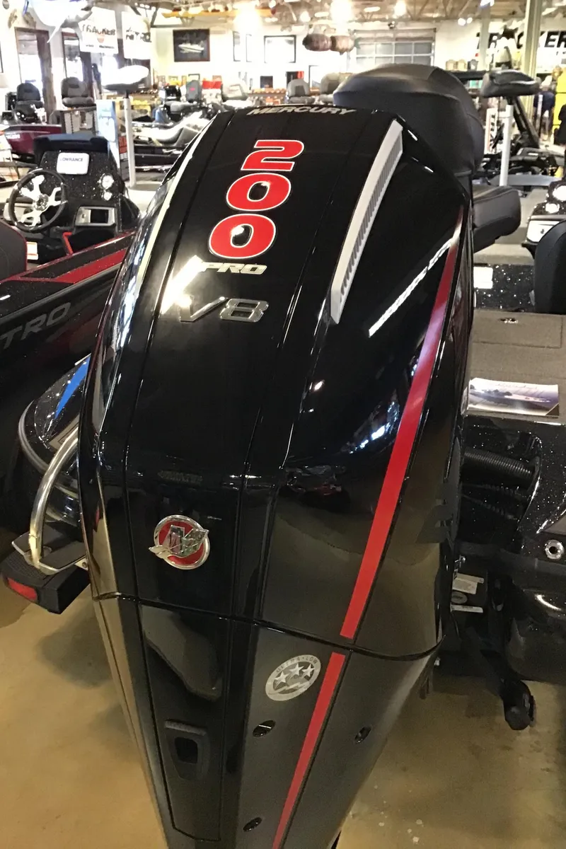 Slide: The Image of 2024 Nitro Z19 boat engine, 200 HP V8, black with red accents. - 3