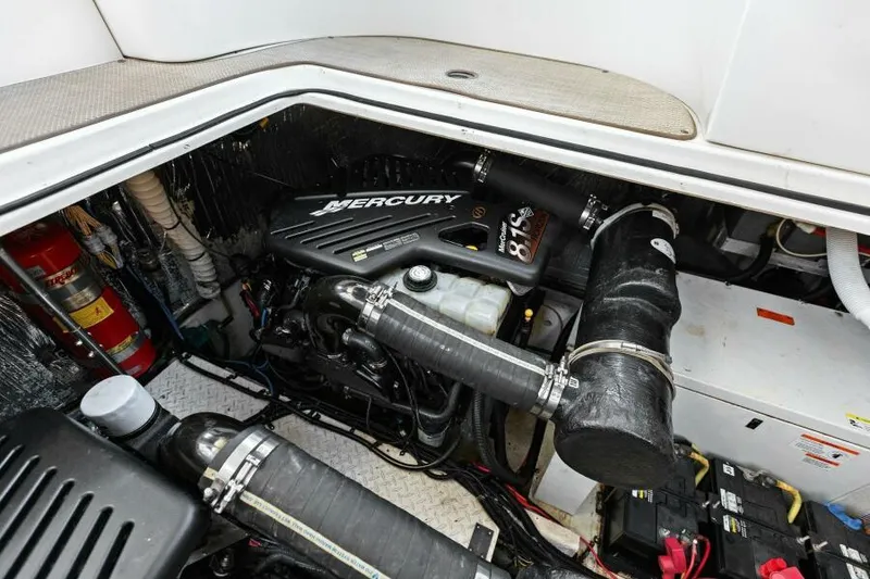Slide: The Image of 2002 Cruisers Yachts 3672 Express engine compartment with Mercury engine. - 44