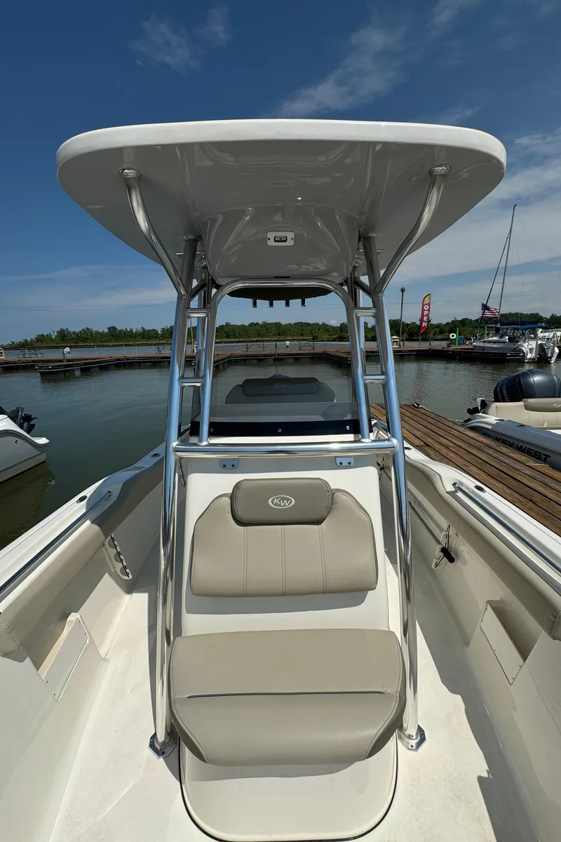Slide: The Image of 2023 Key West 239 FS boat interior with seating and T-top. - 16