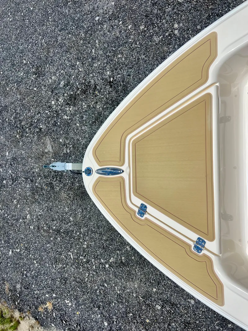 Slide: The Image of 2019 Scout Sportfish 175 boat bow on asphalt. - 23