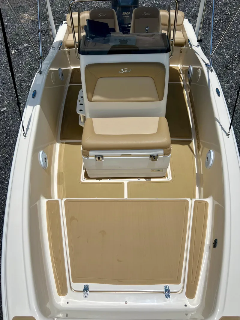 Slide: The Image of 2019 Scout Sportfish 175 boat interior with seating and console. - 24