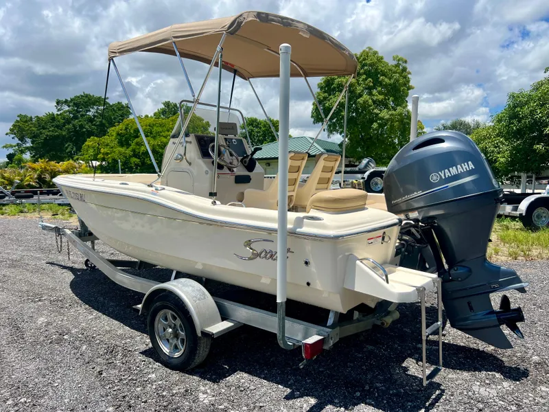 Slide: The Image of 2019 Scout Sportfish 175 boat with Yamaha outboard motor on trailer. - 4