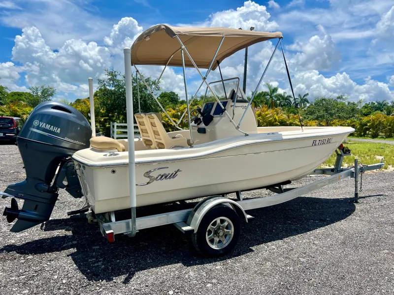 Slide: The Image of 2019 Scout Sportfish 175 boat on trailer with Yamaha outboard motor. - 5