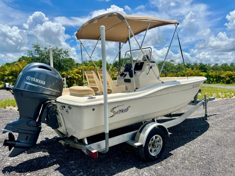 Slide: The Image of 2019 Scout Sportfish 175 boat with Yamaha outboard motor on trailer. - 6