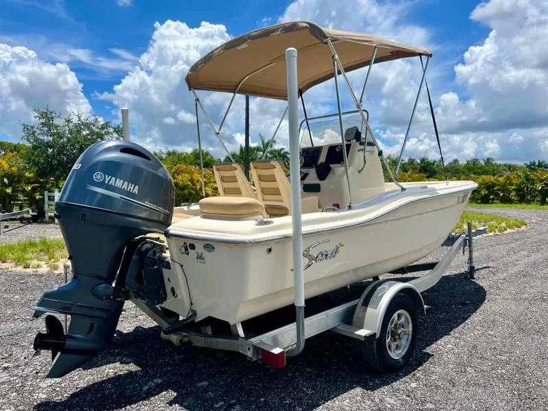 Slide: The Image of 2019 Scout Sportfish 175 boat with Yamaha outboard motor on trailer. - 7