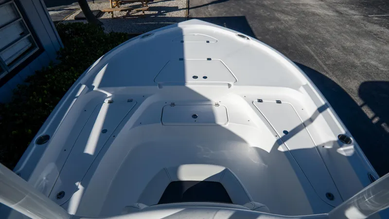 Slide: The Image of 2025 Tidewater 2210 Carolina Bay boat deck with storage compartments. - 18
