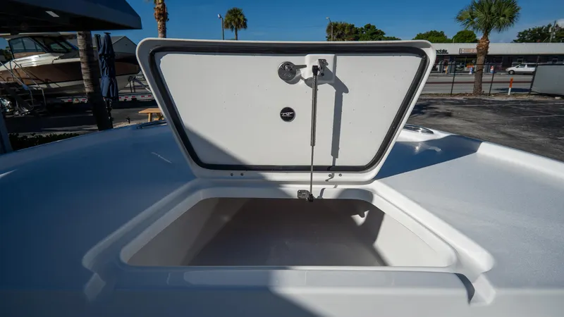 Slide: The Image of Open storage compartment on 2025 Tidewater 2210 Carolina Bay boat. - 22