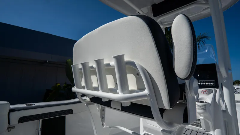Slide: The Image of 2025 Tidewater 220 LXF boat seat with rod holders. - 12