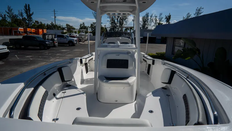 Slide: The Image of 2025 Tidewater 220 LXF boat interior with seating and storage compartments. - 24