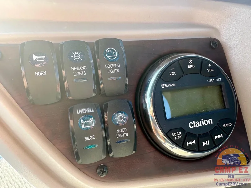 Slide: The Image of Control panel of 2025 South Bay 224FCR LE with Clarion audio system. - 15