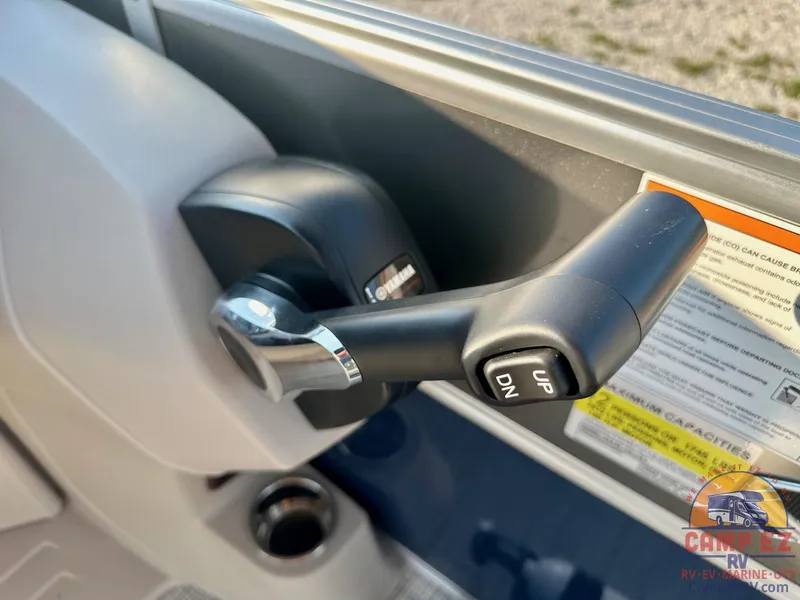 Slide: The Image of Close-up of the control lever on a 2025 South Bay 224FCR LE boat. - 17