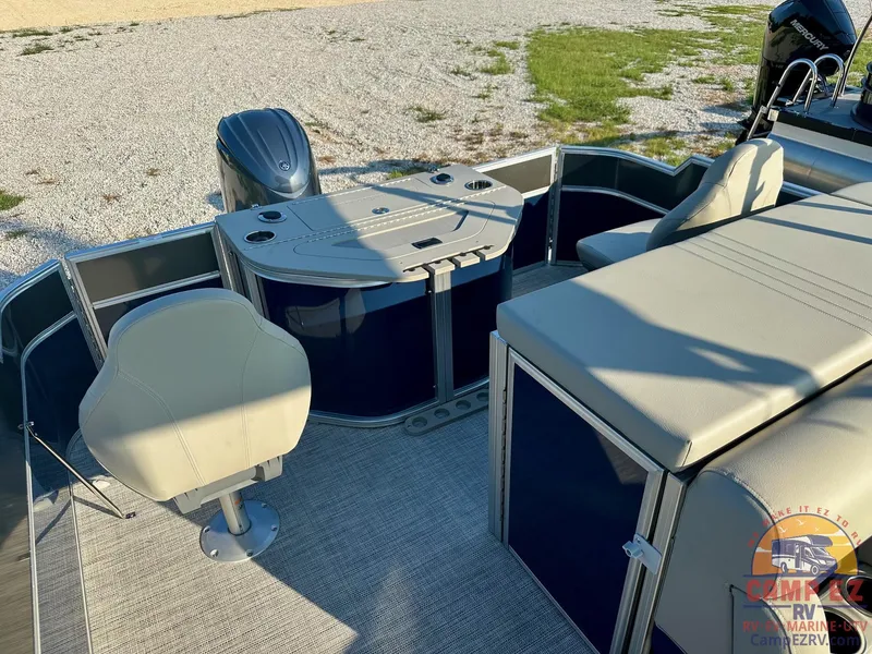 Slide: The Image of 2025 South Bay 224FCR LE pontoon boat interior with seating and helm station. - 18
