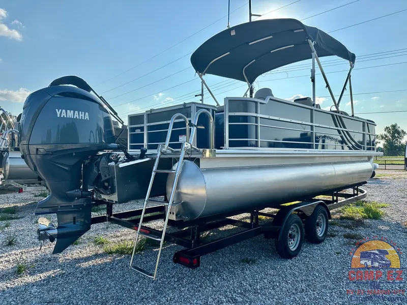 Slide: The Image of 2025 South Bay 224FCR LE pontoon boat with Yamaha outboard motor on trailer. - 6