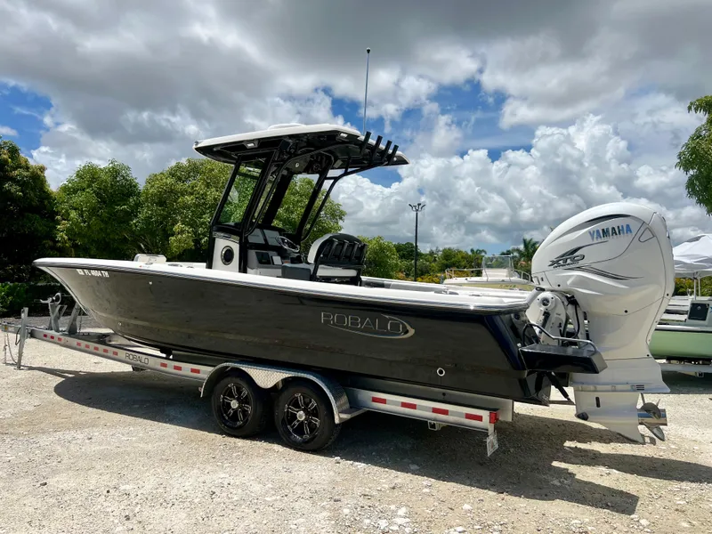 Slide: The Image of 2022 Robalo 266 Cayman boat on a trailer with Yamaha outboard motor. - 10