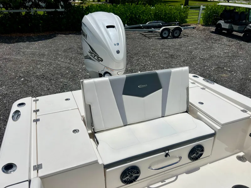 Slide: The Image of 2022 Robalo 266 Cayman boat with Yamaha V8 outboard engine and rear seating. - 31