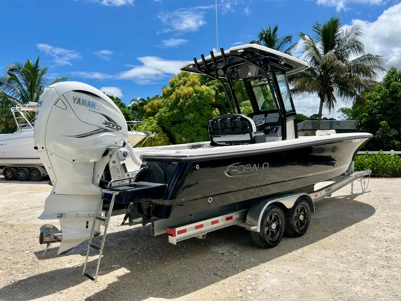 Slide: The Image of 2022 Robalo 266 Cayman boat on trailer with Yamaha outboard motor. - 38
