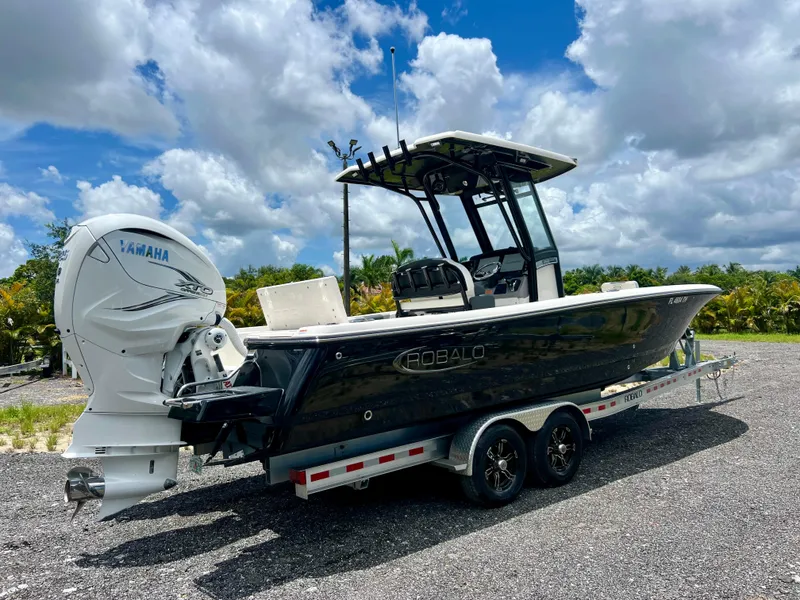Slide: The Image of 2022 Robalo 266 Cayman boat with Yamaha engine on trailer. - 39