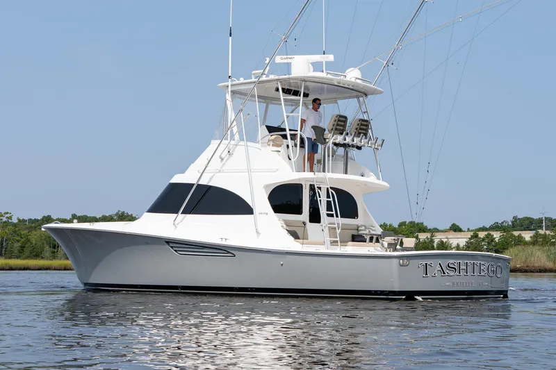 Slide: The Image of 2022 Viking 46 Billfish yacht on calm water, side view. - 14