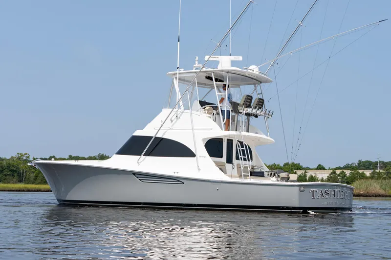 Slide: The Image of 2022 Viking 46 Billfish yacht on calm water, side view. - 15