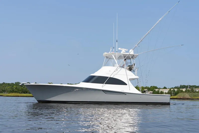 Slide: The Image of 2022 Viking 46 Billfish yacht on calm water, side view. - 18