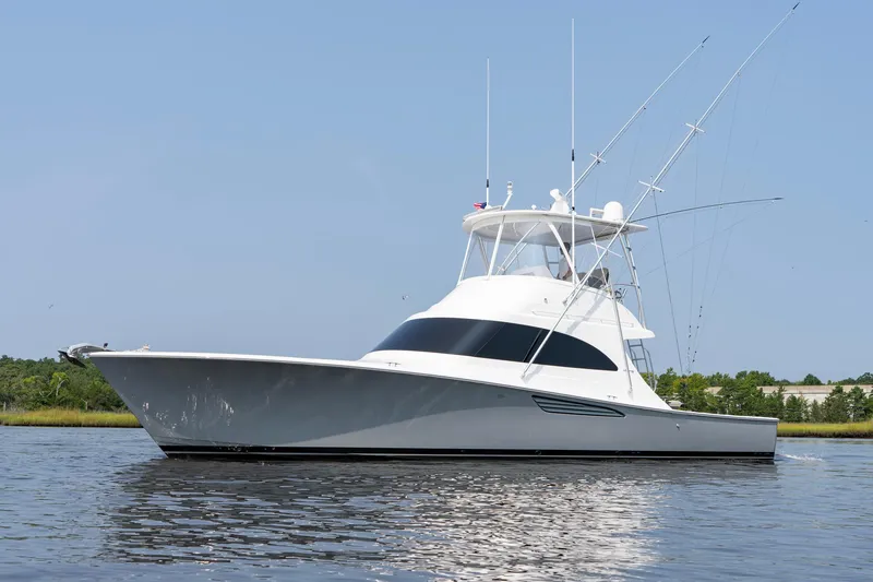 Slide: The Image of 2022 Viking 46 Billfish yacht on calm water, side view. - 19