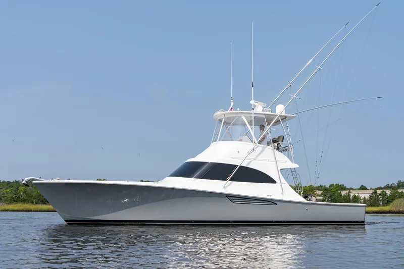 Slide: The Image of 2022 Viking 46 Billfish yacht on calm water, side view. - 20