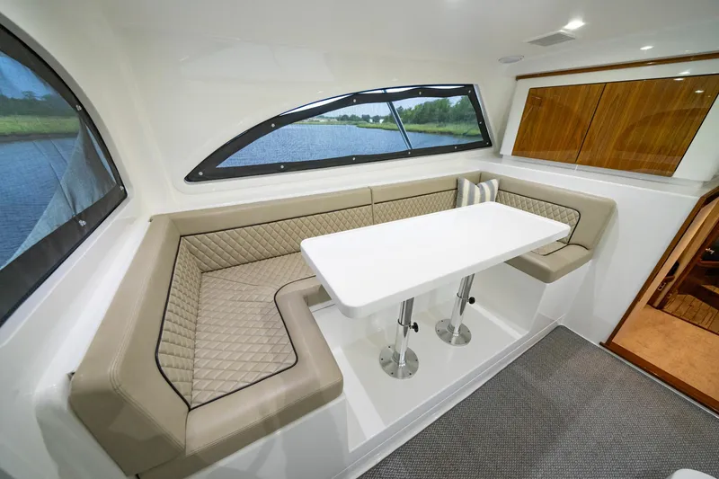 Slide: The Image of Luxurious interior of 2022 Viking 46 Billfish yacht with elegant seating and table. - 33