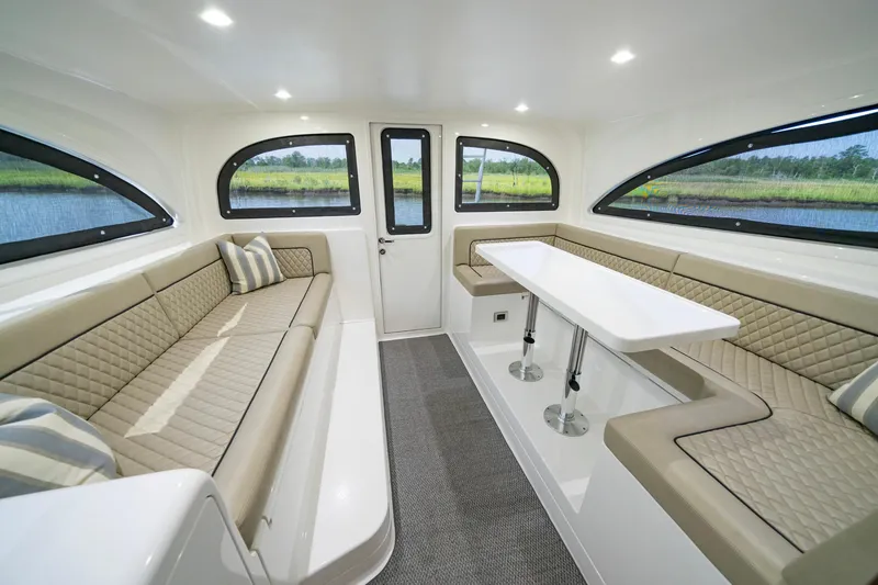 Slide: The Image of Luxurious interior of 2022 Viking 46 Billfish yacht with elegant seating and table. - 35