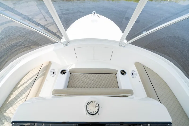 Slide: The Image of 2022 Viking 46 Billfish boat interior with cushioned seating and sleek design. - 36