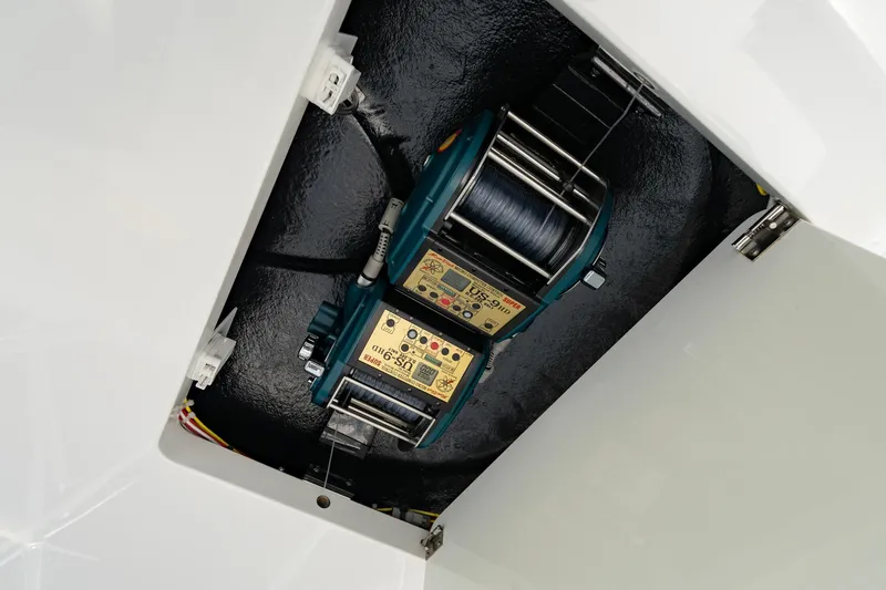 Slide: The Image of Viking 46 Billfish 2022 boat equipment, featuring a mounted electric reel system. - 37