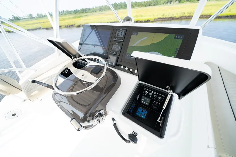 Slide: The Image of 2022 Viking 46 Billfish helm with advanced navigation and control systems. - 41