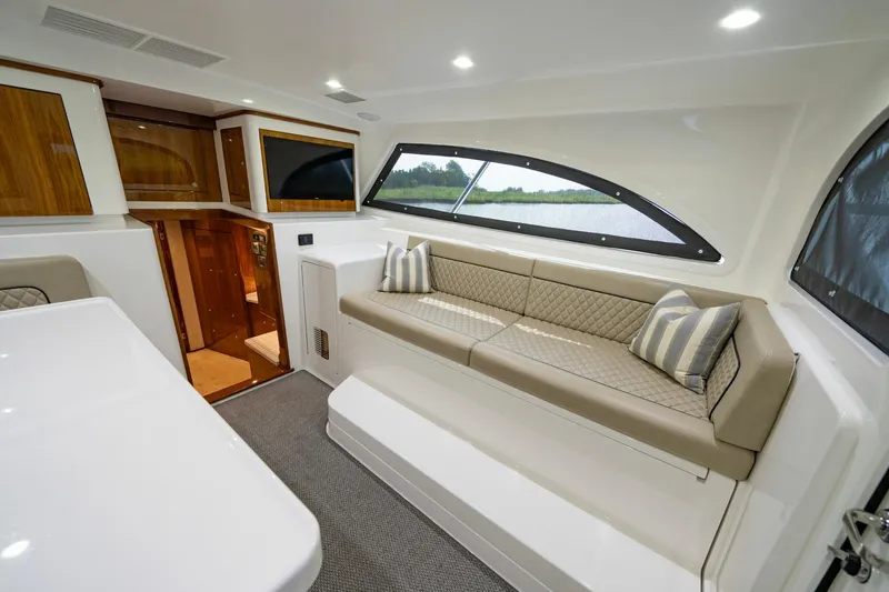 Slide: The Image of Luxurious interior of 2022 Viking 46 Billfish yacht with elegant seating and modern design. - 47