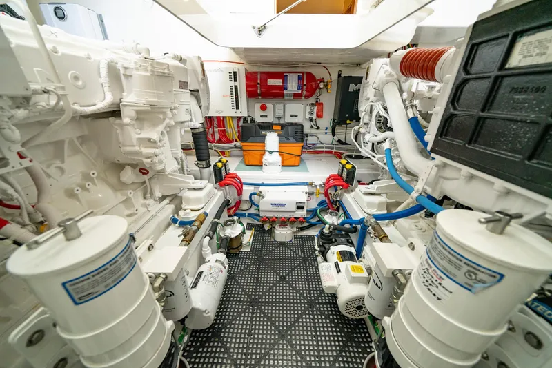 Slide: The Image of Engine room of 2022 Viking 46 Billfish yacht, showcasing advanced machinery and equipment. - 9