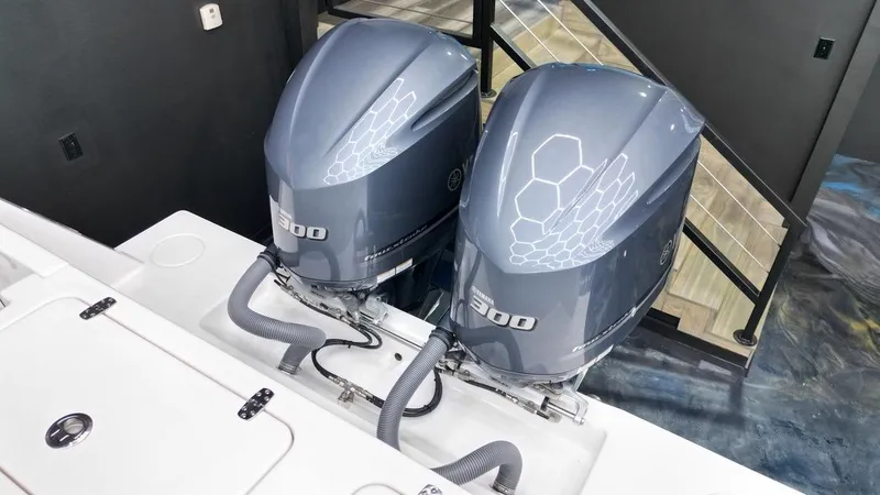 Slide: The Image of 2019 Contender 32 ST boat with twin 300 horsepower outboard engines. - 3