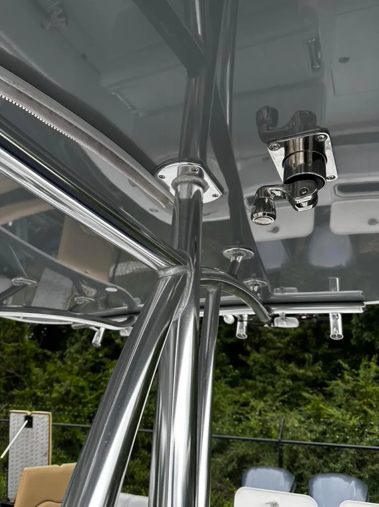 Slide: The Image of 2019 Contender 32 ST boat with stainless steel T-top frame. - 5