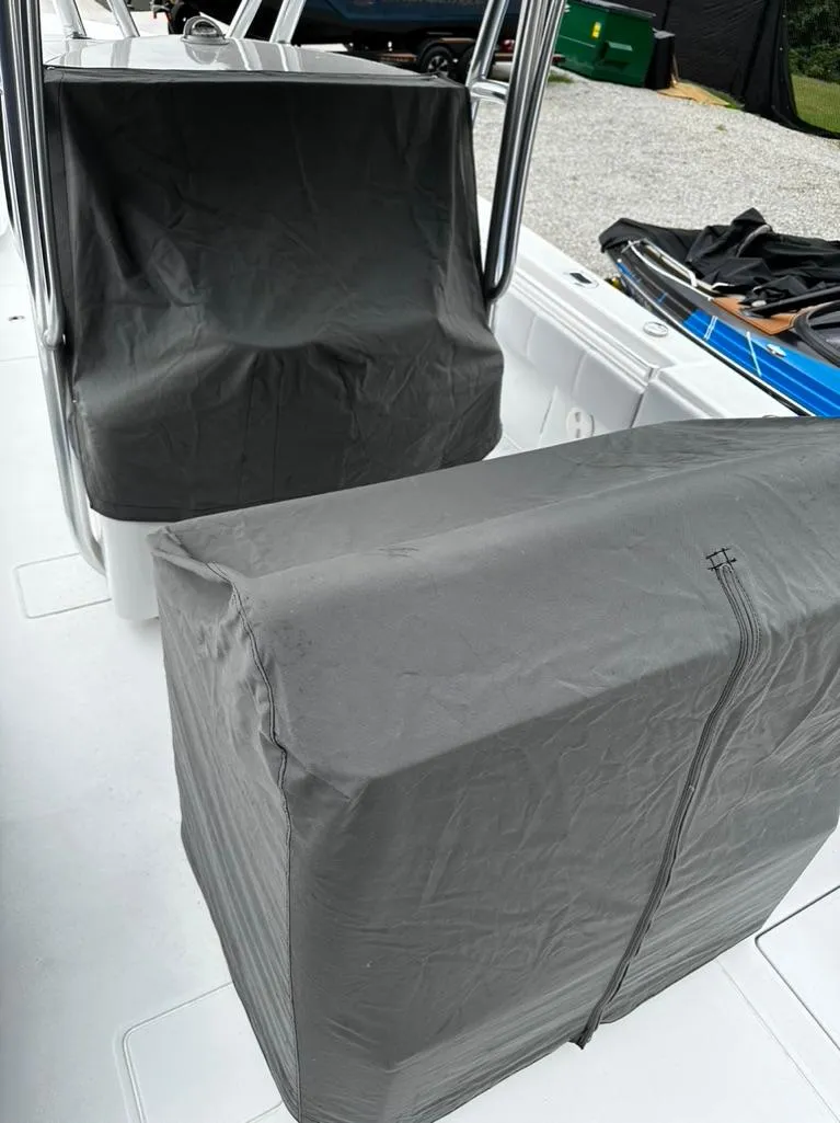 Slide: The Image of 2019 Contender 32 ST boat with covered seating and console. - 6