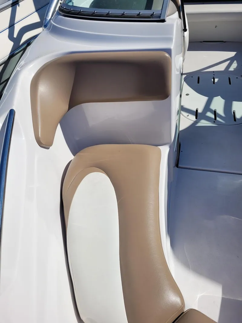 Slide: The Image of 2007 Four Winns 190 Horizon boat interior with tan and white seating. - 7