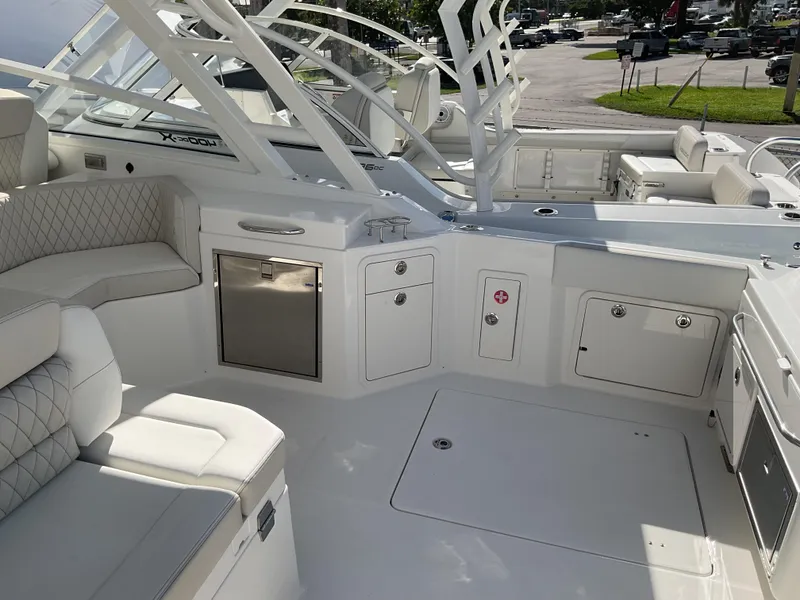 Slide: The Image of Luxurious 2025 World Cat 400 DC-IS boat interior with plush seating and modern amenities. - 35