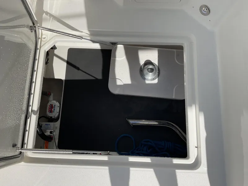 Slide: The Image of 2025 World Cat 400 DC-IS boat cockpit with modern steering and control panel. - 15