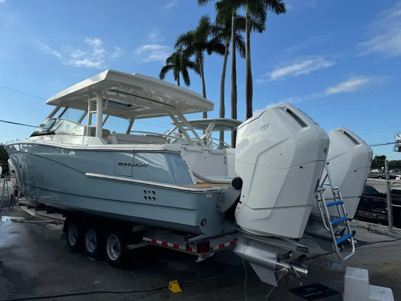 Slide: The Image of 2025 World Cat 400 DC-IS boat deck with kitchen and storage features. - 3