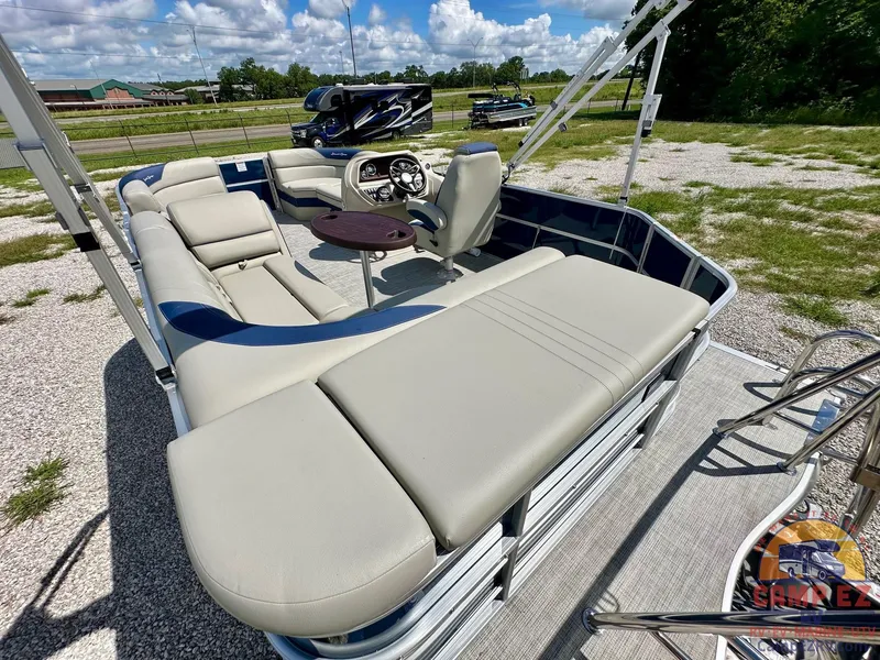 Slide: The Image of 2025 South Bay 220CR LE pontoon boat with spacious seating and modern design. - 11