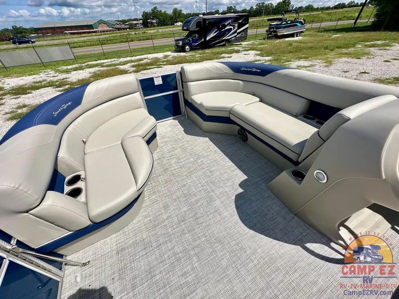 Slide: The Image of 2025 South Bay 220CR LE pontoon boat with spacious seating and modern design. - 21