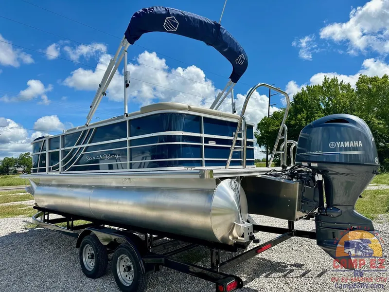 Slide: The Image of 2025 South Bay 220CR LE pontoon boat with Yamaha outboard motor on trailer. - 5
