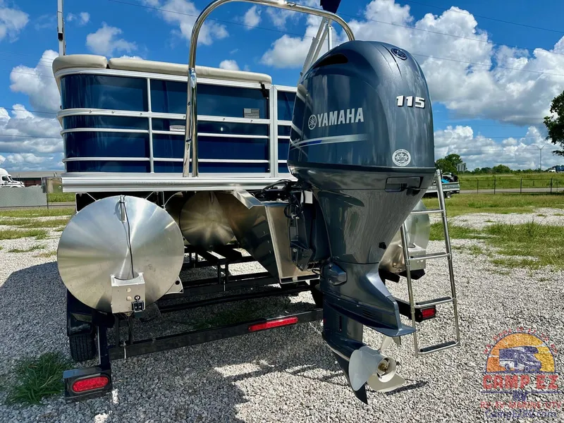 Slide: The Image of Rear view of 2025 South Bay 220CR LE pontoon boat with Yamaha 115 outboard motor. - 6