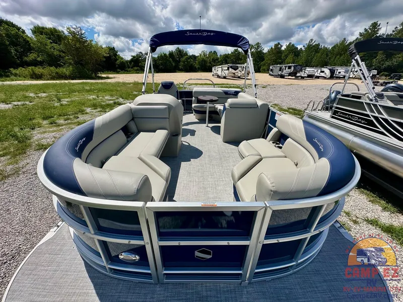 Slide: The Image of 2025 South Bay 220CR LE pontoon boat with spacious seating and canopy. - 8