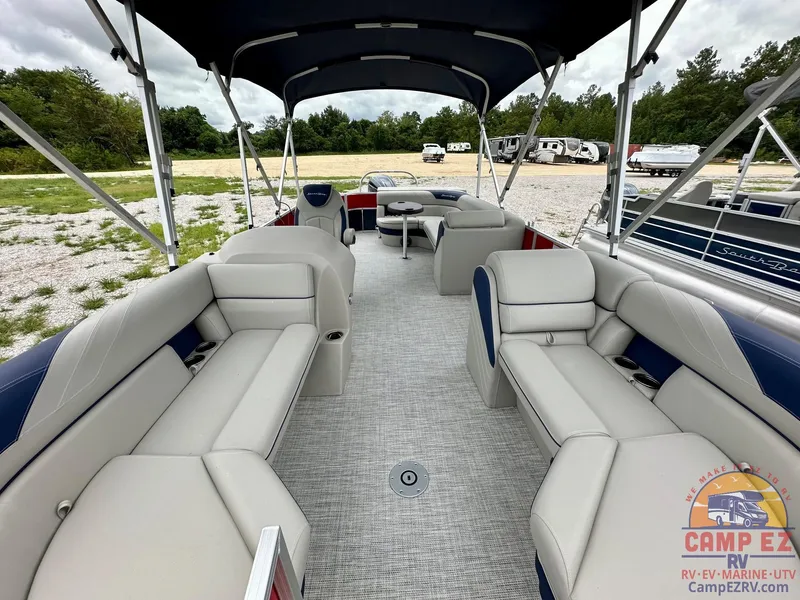 Slide: The Image of 2025 South Bay 224CR LE pontoon boat interior with spacious seating and canopy. - 23
