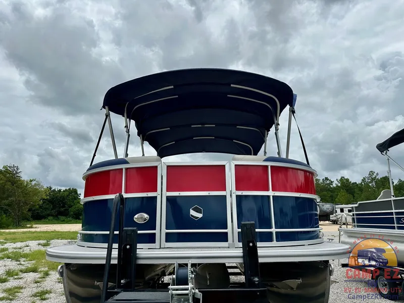 Slide: The Image of 2025 South Bay 224CR LE pontoon boat with canopy, front view. - 3